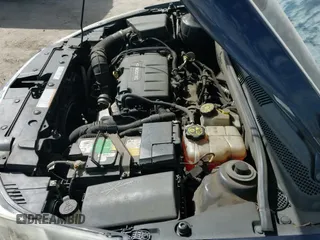 2014 Chevrolet Cruze 1LT z VIN 1G1PC5SB2E7352084, wystawiony jako IAAI lot #43372143 z przebiegiem 152 758 mil mil oraz . Historia ofert i sprzedaży dostępna na DreamBid. Obrazek 14.