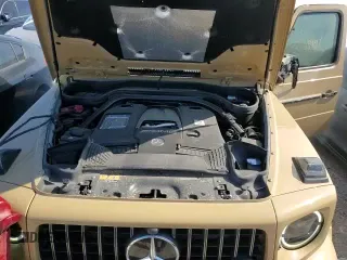 ✅ 2023 Mercedes-Benz G 63 AMG • VIN: W1NYC7HJ3PX484773 • Lot: 71313645. Wystawiony na Copart z przebiegiem 19 941 mil. Bezpłatny archiwum sprzedaży aukcyjnych z USA i szczegółowy raport historii pojazdu na DreamBid. Zdjęcie 16.