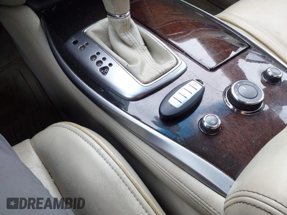 ✅ 2013 Infiniti JX35 • VIN: 5N1AL0MM7DC307657 • Lot: 41512228. Listed on IAAI with 73,542 mi. Free auction sales archive from the USA and detailed vehicle history report at DreamBid. Image 11.