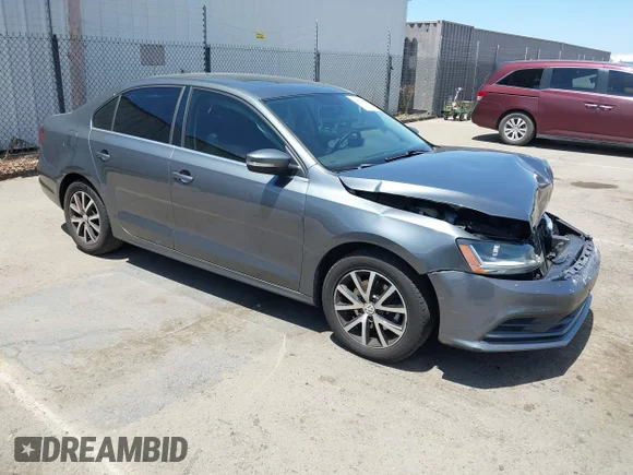 ✅ 2018 Volkswagen Jetta SE • VIN: 3VWDB7AJ9JM259674 • Lot: 44971229. Wystawiony na IAAI z przebiegiem 128 266 mil. Bezpłatny archiwum sprzedaży aukcyjnych z USA i szczegółowy raport historii pojazdu na DreamBid. Zdjęcie 1.