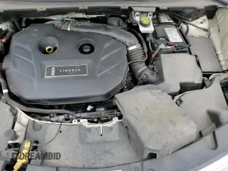 ✅ 2018 Lincoln MKC Reserve • VIN: 5LMTJ3DH4JUL00266 • Lot: 69427585. Listed on Copart with 81,676 mi. Free auction sales archive from the USA and detailed vehicle history report at DreamBid. Image 15.