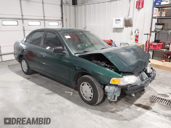 ✅ 1999 Mitsubishi Mirage DE • VIN: JA3AY26A7XU005710 • Lot: 44242038. Wystawiony na IAAI z przebiegiem 102 853 mil. Bezpłatny archiwum sprzedaży aukcyjnych z USA i szczegółowy raport historii pojazdu na DreamBid. Zdjęcie 1.