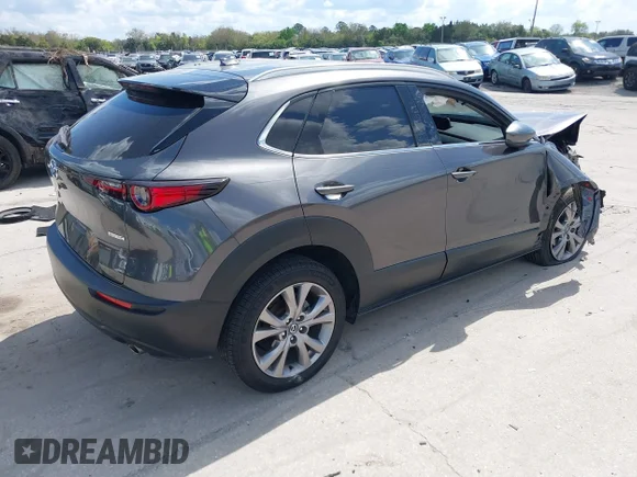 ✅ 2020 Mazda CX-30 Premium • VIN: 3MVDMAEM4LM114638 • Лот: 41687033. Опубліковано раніше на IAAI з пробігом 55 389 миль. Безкоштовний доступ до архіву аукціонних продажів зі США та докладний звіт про історію автомобіля на DreamBid. Зображення 4.