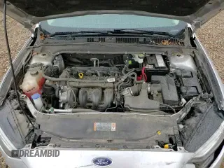 ✅ 2018 Ford Fusion S • VIN: 3FA6P0G76JR165261 • Лот: 90377715. Опубликован ранее на Copart с пробегом 87 901 миль. Бесплатный доступ к архиву аукционных продаж из США и подробный отчёт об истории автомобиля на DreamBid. Изображение 14.