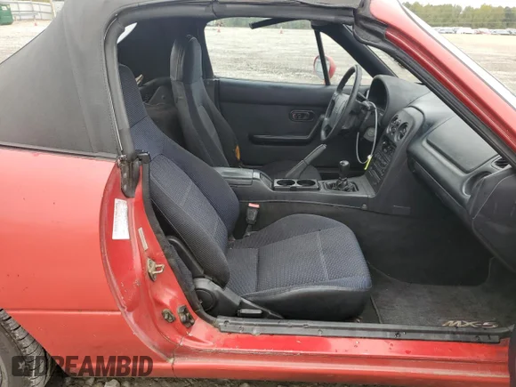 ✅ 1996 Mazda MX-5 Miata • VIN: JM1NA3533T0708657 • Lot: 80127384. Wystawiony na Copart z przebiegiem 241 861 mil. Bezpłatny archiwum sprzedaży aukcyjnych z USA i szczegółowy raport historii pojazdu na DreamBid. Zdjęcie 10.