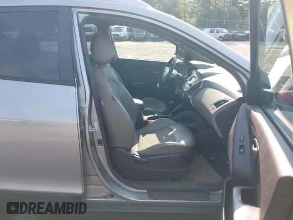 ✅ 2015 Hyundai Tucson SE • VIN: KM8JUCAG8FU090971 • Lot: 45498203. Listed on IAAI with 210,050 mi. Free auction sales archive from the USA and detailed vehicle history report at DreamBid. Image 5.