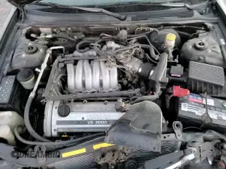 ✅ 1997 Nissan Maxima GXE • VIN: JN1CA21D1VM517494 • Lot: 83239334. Wystawiony na Copart z przebiegiem 149 077 mil. Bezpłatny archiwum sprzedaży aukcyjnych z USA i szczegółowy raport historii pojazdu na DreamBid. Zdjęcie 13.