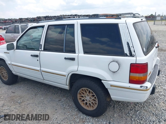 ✅ 1995 Jeep Grand Cherokee Limited • VIN: 1J4GZ78Y8SC763399 • Lot: 42308634. Wystawiony na IAAI z przebiegiem 335 962 mil. Bezpłatny archiwum sprzedaży aukcyjnych z USA i szczegółowy raport historii pojazdu na DreamBid. Zdjęcie 6.