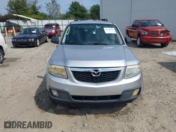 ✅ 2010 Mazda Tribute Sport • VIN: 4F2CY0C79AKM02295 • Лот: 43296225. Опубліковано раніше на IAAI з пробігом 261 907 миль. Безкоштовний доступ до архіву аукціонних продажів зі США та докладний звіт про історію автомобіля на DreamBid. Зображення 6.