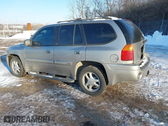 ✅ 2003 GMC Envoy SLT • VIN: 1GKDT13S032261346 • Lot: 44273694. Wystawiony na IAAI z przebiegiem 127 601 mil. Bezpłatny archiwum sprzedaży aukcyjnych z USA i szczegółowy raport historii pojazdu na DreamBid. Zdjęcie 3.