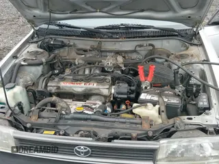 ✅ 1991 Toyota Corolla • VIN: 2T1AE94A6MC082910 • Лот: 43028426. Опубликован ранее на IAAI с пробегом 105 269 миль. Бесплатный доступ к архиву аукционных продаж из США и подробный отчёт об истории автомобиля на DreamBid. Изображение 12.