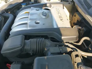 ✅ 2006 Kia Optima LX • VIN: KNAGE123165021221 • Lot: 43058676. Listed on IAAI with 320,203 mi. Free auction sales archive from the USA and detailed vehicle history report at DreamBid. Image 14.