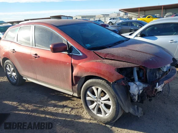 ✅ 2010 Mazda CX-7 Grand Touring • VIN: JM3ER2W35A0300229 • Lot: 44026125. Listed on IAAI with 102,998 mi. Free auction sales archive from the USA and detailed vehicle history report at DreamBid. Image 1.