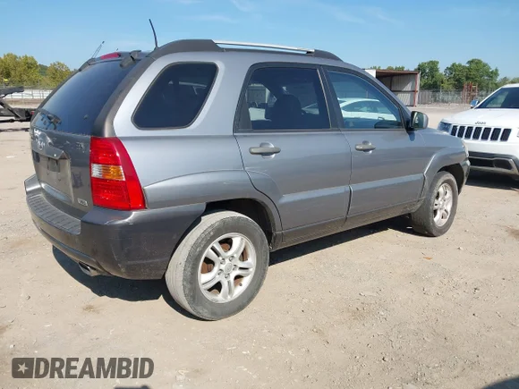 ✅ 2005 Kia Sportage LX • VIN: KNDJF723257092942 • Lot: 43180988. Wystawiony na IAAI z przebiegiem 166 432 mil. Bezpłatny archiwum sprzedaży aukcyjnych z USA i szczegółowy raport historii pojazdu na DreamBid. Zdjęcie 4.