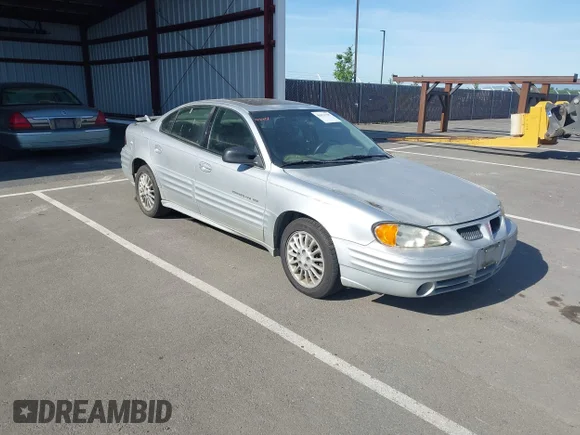 ✅ 2001 Pontiac Grand Am SE1 • VIN: 1G2NF52TX1M628350 • Lot: 45071795. Listed on IAAI with 332,467 mi. Free auction sales archive from the USA and detailed vehicle history report at DreamBid. Image 1.
