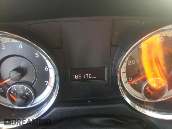 ✅ 2013 Dodge Grand Caravan SE • VIN: 2C4RDGBG2DR760649 • Lot: 77377114. Listed on Copart with 186,178 mi. Free auction sales archive from the USA and detailed vehicle history report at DreamBid. Image 9.