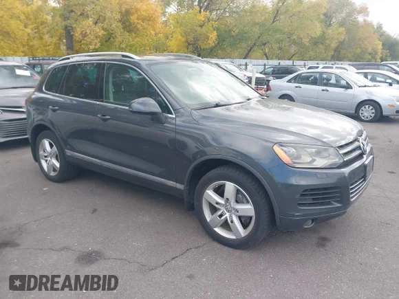 ✅ 2011 Volkswagen Touareg • VIN: WVGFG9BP6BD002363 • Lot: 43541528. Listed on IAAI with 158,306 mi. Free auction sales archive from the USA and detailed vehicle history report at DreamBid. Image 1.