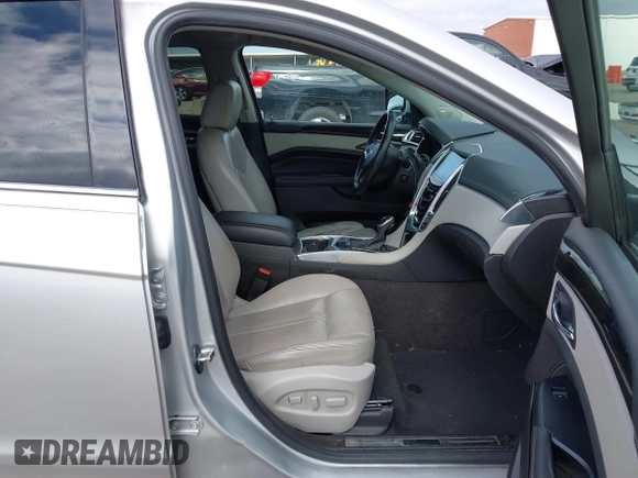 ✅ 2015 Cadillac SRX Luxury Collection • VIN: 3GYFNBE32FS581801 • Lot: 44383825. Wystawiony na IAAI z przebiegiem 96 882 mil. Bezpłatny archiwum sprzedaży aukcyjnych z USA i szczegółowy raport historii pojazdu na DreamBid. Zdjęcie 5.