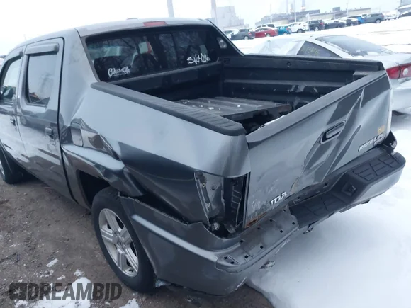 ✅ 2012 Honda Ridgeline RTL • VIN: 5FPYK1F59CB451205 • Лот: 41264537. Опубликован ранее на IAAI с пробегом 215 409 миль. Бесплатный доступ к архиву аукционных продаж из США и подробный отчёт об истории автомобиля на DreamBid. Изображение 6.