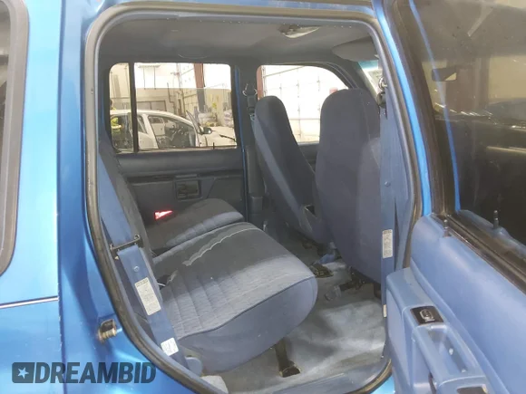 ✅ 1993 Ford Explorer Eddie Bauer • VIN: 1FMDU34X5PUC16147 • Lot: 45049457. Listed on IAAI with 52,774 mi. Free auction sales archive from the USA and detailed vehicle history report at DreamBid. Image 8.