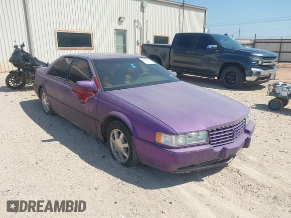 ✅ 1997 Cadillac Seville STS • VIN: 1G6KY5290VU808264 • Lot: 42904622. Wystawiony na IAAI z przebiegiem 65 521 mil. Bezpłatny archiwum sprzedaży aukcyjnych z USA i szczegółowy raport historii pojazdu na DreamBid. Zdjęcie 1.