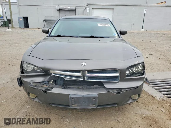 ✅ 2009 Dodge Charger R/T • VIN: 2B3LA53T79H590687 • Лот: 50005916. Опубліковано раніше на Copart з пробігом 221 437 миль. Безкоштовний доступ до архіву аукціонних продажів зі США та докладний звіт про історію автомобіля на DreamBid. Зображення 5.