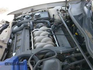 ✅ 2001 Lincoln Continental • VIN: 1LNHM97V51Y651670 • Lot: 42573154. Wystawiony na IAAI z przebiegiem 135 487 mil. Bezpłatny archiwum sprzedaży aukcyjnych z USA i szczegółowy raport historii pojazdu na DreamBid. Zdjęcie 21.