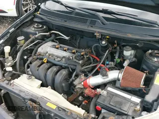 ✅ 2003 Toyota Matrix Std • VIN: 2T1KR32E03C100487 • Lot: 43173665. Listed on IAAI with 200,399 mi. Free auction sales archive from the USA and detailed vehicle history report at DreamBid. Image 12.