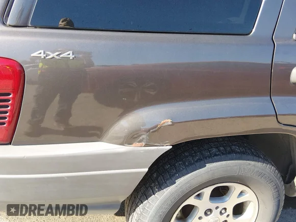 ✅ 2000 Jeep Grand Cherokee Laredo • VIN: 1J4GW48N9YC109792 • Lot: 45005066. Listed on IAAI with 189,294 mi. Free auction sales archive from the USA and detailed vehicle history report at DreamBid. Image 6.