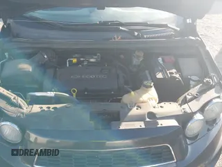 ✅ 2014 Chevrolet Sonic LT • VIN: 1G1JC5SH0E4228312 • Lot: 43579562. Listed on IAAI with 136,210 mi. Free auction sales archive from the USA and detailed vehicle history report at DreamBid. Image 12.