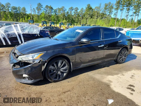 ✅ 2019 Nissan Altima Platinum • VIN: 1N4BL4FW5KN327153 • Lot: 49404746. Listed on Copart with 90,461 mi. Free auction sales archive from the USA and detailed vehicle history report at DreamBid. Image 1.
