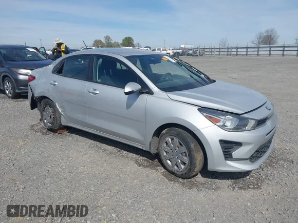 ✅ 2021 Kia Rio LX • VIN: 3KPA24AD7ME395587 • Лот: 44679947. Опубліковано раніше на IAAI з пробігом 100 427 миль. Безкоштовний доступ до архіву аукціонних продажів зі США та докладний звіт про історію автомобіля на DreamBid. Зображення 1.