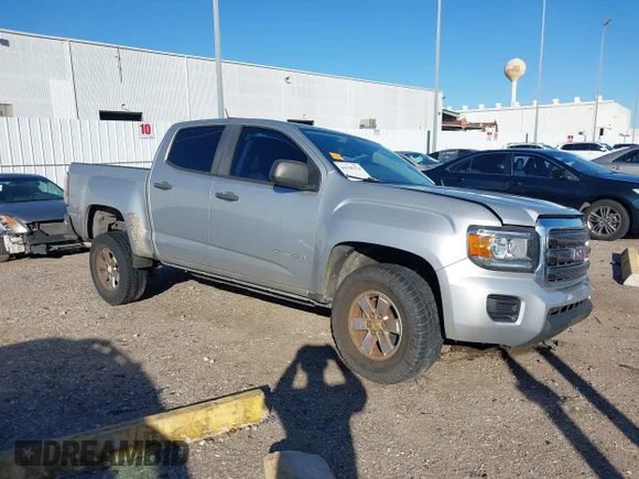 ✅ 2015 GMC Canyon 2WD • VIN: 1GTG5AEA7F1210850 • Lot: 44158324. Listed on IAAI with 113,735 mi. Free auction sales archive from the USA and detailed vehicle history report at DreamBid. Image 1.
