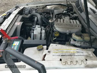 ✅ 1996 Ford Thunderbird LX • VIN: 1FALP6246TH160357 • Лот: 41442234. Опубликован ранее на IAAI с пробегом 99 815 миль. Бесплатный доступ к архиву аукционных продаж из США и подробный отчёт об истории автомобиля на DreamBid. Изображение 12.