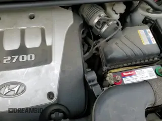 2006 Hyundai Tucson GLS z VIN KM8JN12D76U348077, wystawiony jako Copart lot #85163994 z przebiegiem 152 772 mil mil oraz Czysty tytuł • Clean title. Historia ofert i sprzedaży dostępna na DreamBid. Obrazek 14.