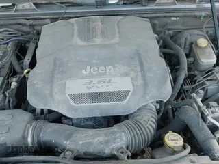 ✅ 2012 Jeep Wrangler Unlimited Sport • VIN: 1C4BJWDG8CL143023 • Lot: 43447646. Listed on IAAI with 119,924 mi. Free auction sales archive from the USA and detailed vehicle history report at DreamBid. Image 22.