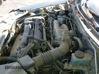 ✅ 1998 Mazda Protege DX • VIN: JM1BC1411W0218000 • Lot: 43668274. Wystawiony na IAAI z przebiegiem 201 941 mil. Bezpłatny archiwum sprzedaży aukcyjnych z USA i szczegółowy raport historii pojazdu na DreamBid. Zdjęcie 12.