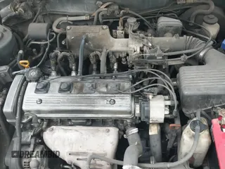 ✅ 1995 Toyota Corolla DX • VIN: 1NXAE09B5SZ343971 • Лот: 42409335. Опубликован ранее на IAAI с пробегом 282 196 миль. Бесплатный доступ к архиву аукционных продаж из США и подробный отчёт об истории автомобиля на DreamBid. Изображение 18.