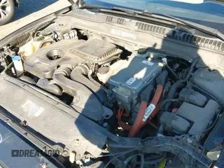 ✅ 2015 Ford Fusion S Hybrid • VIN: 3FA6P0UU7FR117785 • Лот: 41589546. Опубликован ранее на IAAI с пробегом 136 657 миль. Бесплатный доступ к архиву аукционных продаж из США и подробный отчёт об истории автомобиля на DreamBid. Изображение 19.