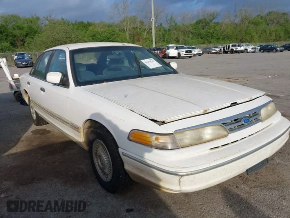 ✅ 1997 Ford Crown Victoria • VIN: 2FALP73W7VX200891 • Lot: 41934703. Listed on IAAI with 174,861 mi. Free auction sales archive from the USA and detailed vehicle history report at DreamBid. Image 1.