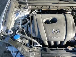 ✅ 2021 Mazda CX-30 Select • VIN: 3MVDMBBL5MM211673 • Лот: 82064105. Опубликован ранее на Copart с пробегом 33 872 миль. Бесплатный доступ к архиву аукционных продаж из США и подробный отчёт об истории автомобиля на DreamBid. Изображение 15.