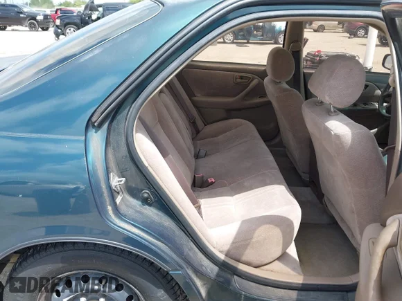 ✅ 1997 Toyota Camry LE • VIN: 4T1BG22K7VU773106 • Lot: 45402537. Wystawiony na IAAI z przebiegiem 239 289 mil. Bezpłatny archiwum sprzedaży aukcyjnych z USA i szczegółowy raport historii pojazdu na DreamBid. Zdjęcie 8.