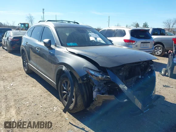 ✅ 2021 Mazda CX-9 Touring • VIN: JM3TCACY4M0509579 • Лот: 41661307. Опубліковано раніше на IAAI з пробігом 101 629 миль. Безкоштовний доступ до архіву аукціонних продажів зі США та докладний звіт про історію автомобіля на DreamBid. Зображення 1.