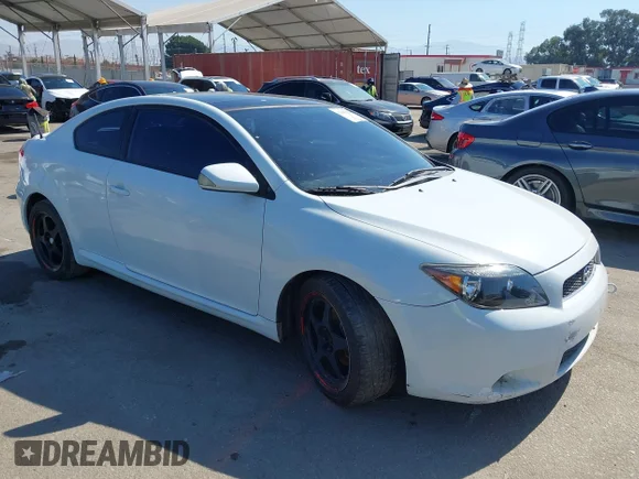 ✅ 2006 Scion tC • VIN: JTKDE177260124252 • Lot: 42941086. Listed on IAAI with 196,398 mi. Free auction sales archive from the USA and detailed vehicle history report at DreamBid. Image 1.