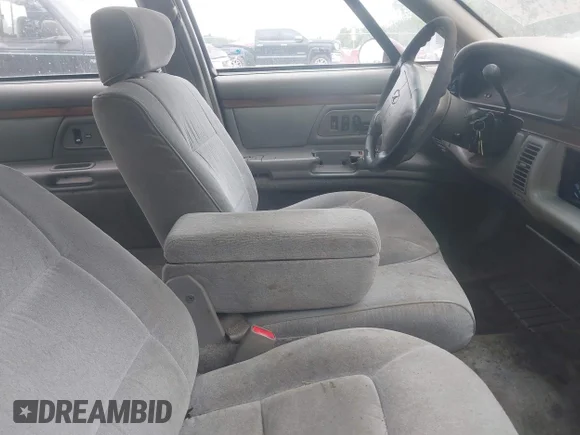 ✅ 1998 Oldsmobile 88 LS • VIN: 1G3HN52K8W4833739 • Lot: 42509984. Wystawiony na IAAI z przebiegiem 130 317 mil. Bezpłatny archiwum sprzedaży aukcyjnych z USA i szczegółowy raport historii pojazdu na DreamBid. Zdjęcie 5.