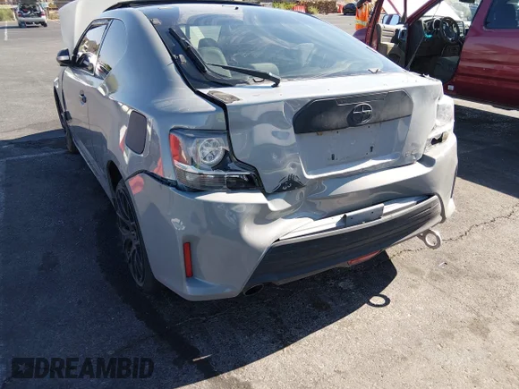 ✅ 2016 Scion tC • VIN: JTKJF5C75GJ015700 • Lot: 45260910. Wystawiony na IAAI z przebiegiem 93 332 mil. Bezpłatny archiwum sprzedaży aukcyjnych z USA i szczegółowy raport historii pojazdu na DreamBid. Zdjęcie 6.