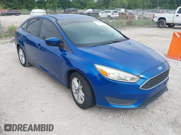 ✅ 2018 Ford Focus SE • VIN: 1FADP3F27JL304973 • Лот: 45516973. Опубликован ранее на IAAI с пробегом 126 823 миль. Бесплатный доступ к архиву аукционных продаж из США и подробный отчёт об истории автомобиля на DreamBid. Изображение 1.