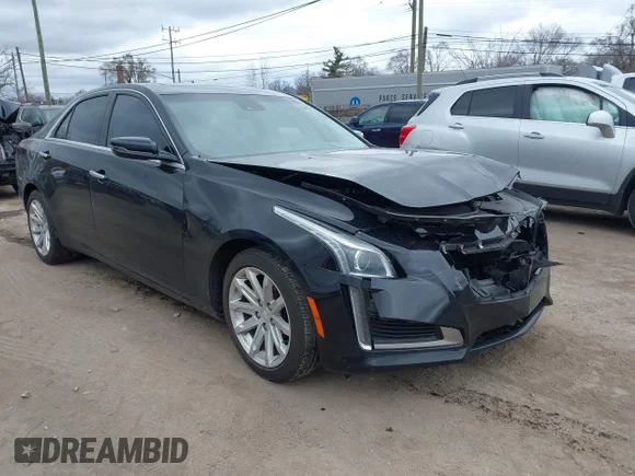 ✅ 2015 Cadillac CTS Luxury RWD • VIN: 1G6AR5SX0F0140112 • Lot: 42032894. Wystawiony na IAAI z przebiegiem 102 784 mil. Bezpłatny archiwum sprzedaży aukcyjnych z USA i szczegółowy raport historii pojazdu na DreamBid. Zdjęcie 1.