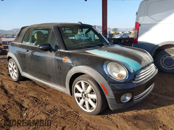 ✅ 2009 MINI Convertible • VIN: WMWMR33509TJ93596 • Lot: 42778138. Listed on IAAI with 76,269 mi. Free auction sales archive from the USA and detailed vehicle history report at DreamBid. Image 1.