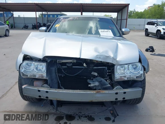 ✅ 2007 Chrysler 300 Touring • VIN: 2C3KA53GX7H608453 • Лот: 42842871. Опубликован ранее на IAAI с пробегом 248 992 миль. Бесплатный доступ к архиву аукционных продаж из США и подробный отчёт об истории автомобиля на DreamBid. Изображение 6.